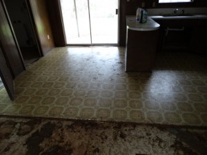 Dated flooring, counter tops and cabinets will be replaced and updated.