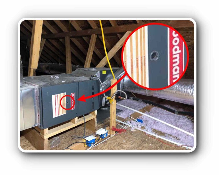 HVAC ductwork installed in an attic with a visible Goodman label.