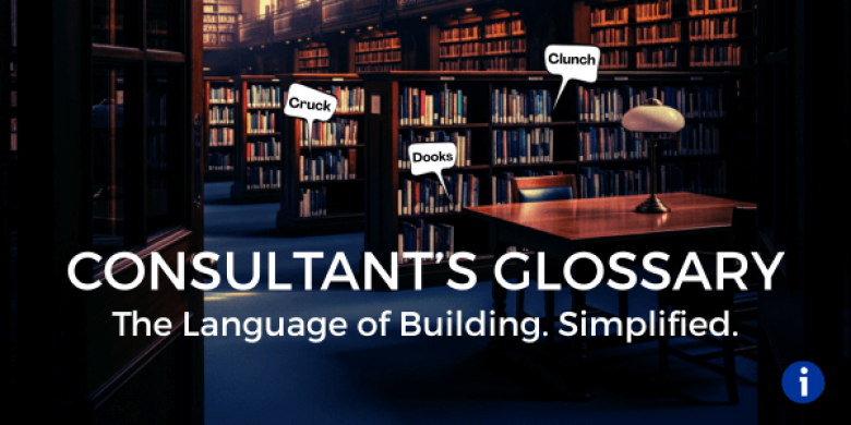 Library interior with tables and labeled bookshelves.